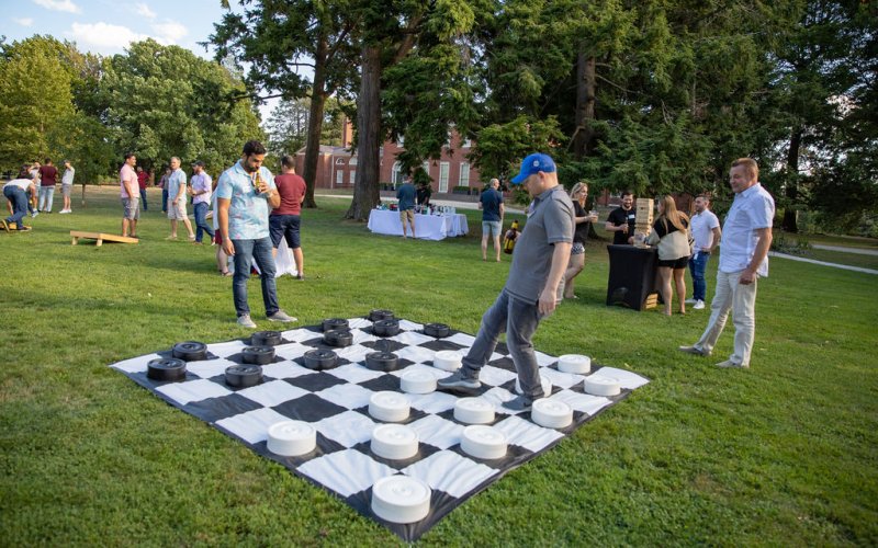 Employees playing lawn games at Gore Mansion 